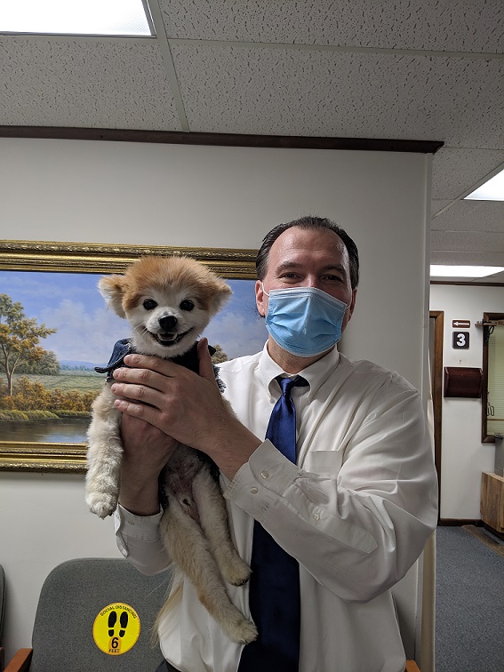 Dr Irhin and a dog