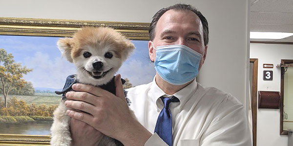 Dr Irhin and a dog